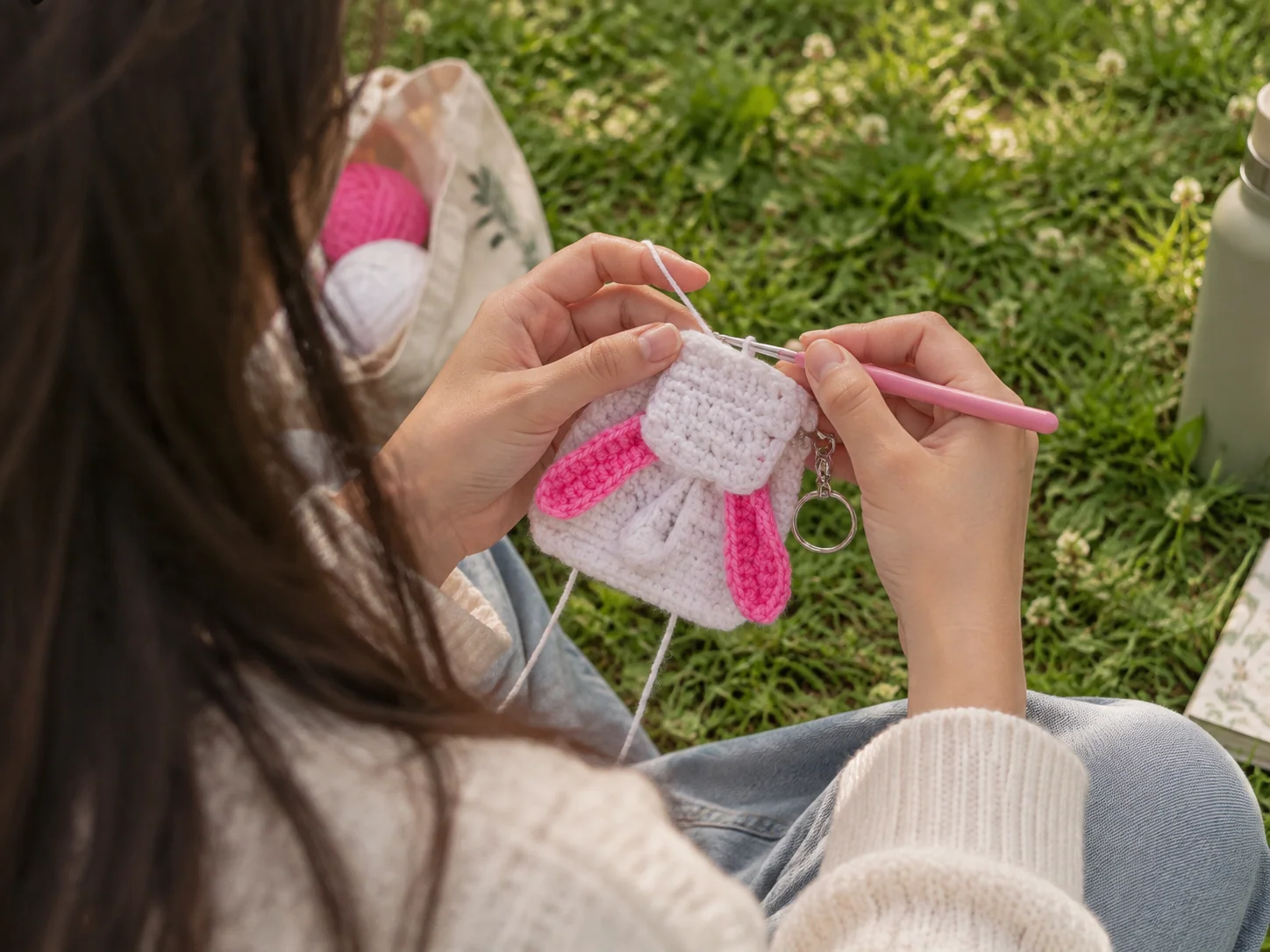 Artist working with yarn and crochet hook